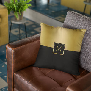 Black and gold split-screen geometric design throw pillow