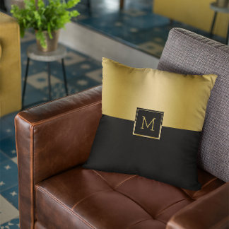 Black and gold split-screen geometric design throw pillow
