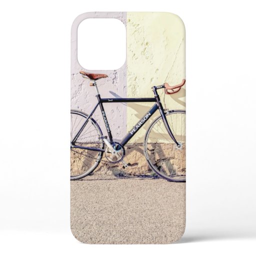 BLACK AND GRAY CITY BIKE LEANING ON WHITE WALL iPhone 12 CASE