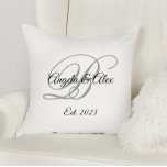 Black and Gray Fancy Wedding Anniversary Monogram Throw Pillow<br><div class="desc">Wedding anniversary elegant square throw pillow with the couple's monogram in a fancy grey and black calligraphy script. Customize the font size as needed for the bride and groom's names. Customize the black and gray colors, as well as the modern calligraphy font styles. The typography designs colors are black, grey...</div>