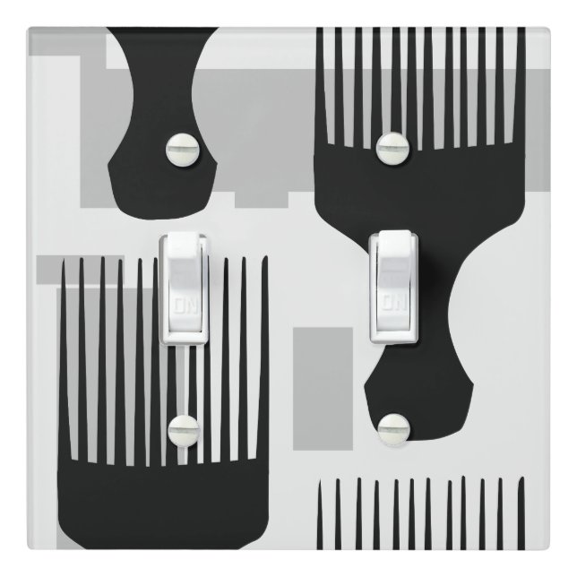 Black and gray Hair Comb Afro Pick Light Switch Cover (In Situ)