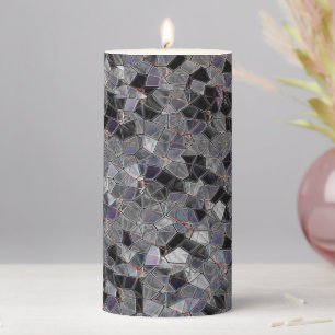 Black and gray mosaic with partially removed color pillar candle