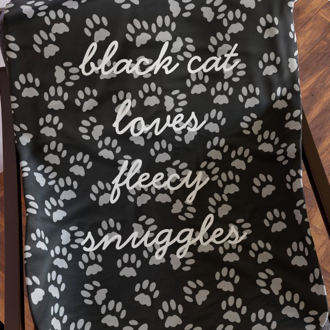 Black and Gray Paw Print Cat Name Fleece Blanket (Black cat loves fleecy snuggles any time of year. Add your text to this soft and warm fleece blanket)