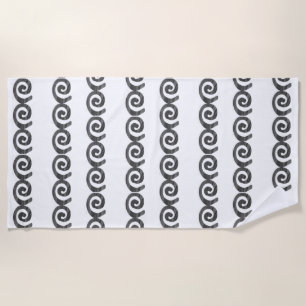 Black and gray spirals pattern on white beach towel