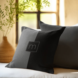 Black and gray split-screen geometric design throw pillow