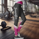Black and pink floral white stripes & name leggings<br><div class="desc">These black modern workout leggings feature an elegant and delicate white floral design on a dark magenta background on the ankles and calves and a fuchsia stripe on the waistband.
Easily customizable by adding your name on both sides on a calligraphy white font.</div>