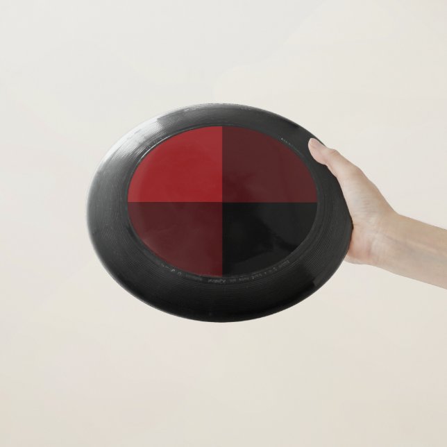 Black and Red Frisbee (In Hand)