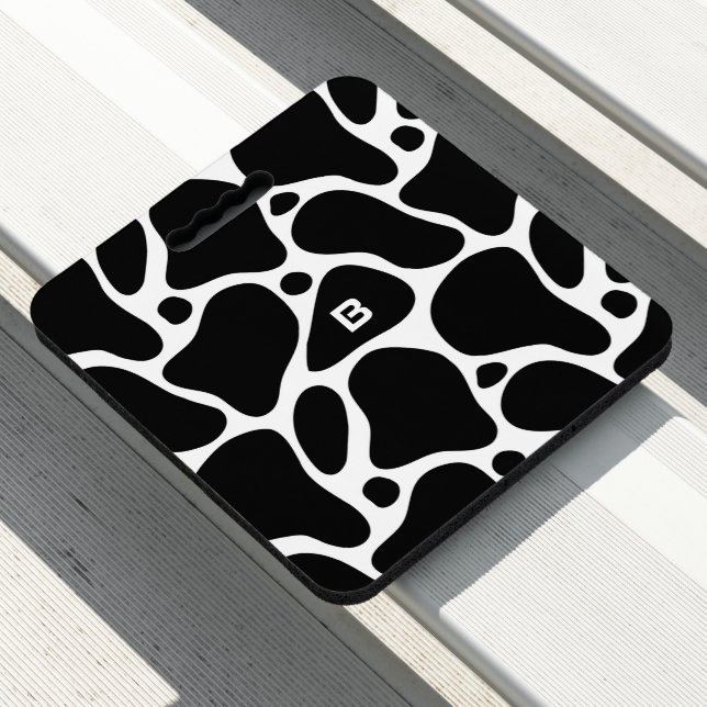 Black and white abstract giraffe pattern seat cushion (In Situ)