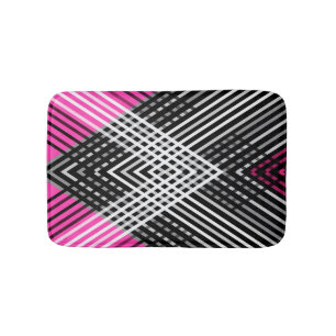 Black and white and gray intertwined stripes on a  bath mat