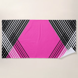 Black and white and gray intertwined stripes on a beach towel