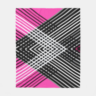 Black and white and gray intertwined stripes on a fleece blanket