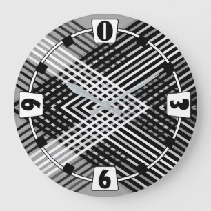 Black and white and gray intertwined stripes on a  large clock