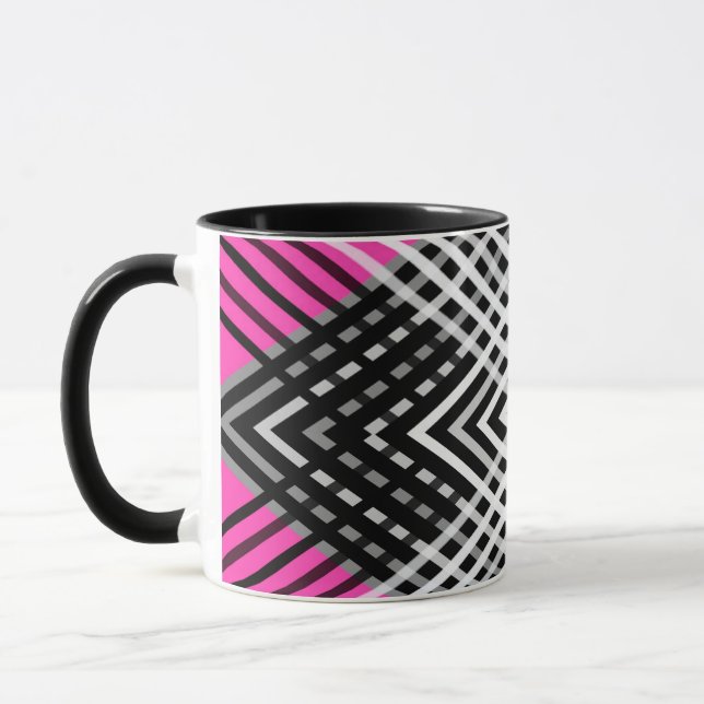 Black and white and gray intertwined stripes on a  mug (Left)