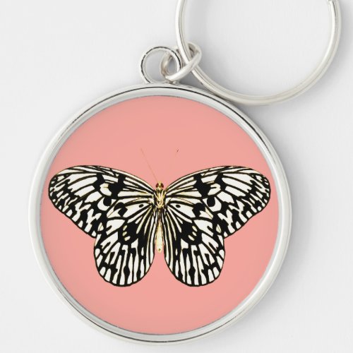 Black and white butterflycoral pink background keychain