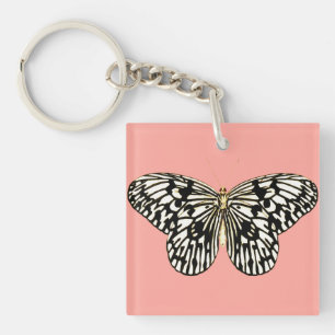 Black and white butterfly,coral pink background keychain