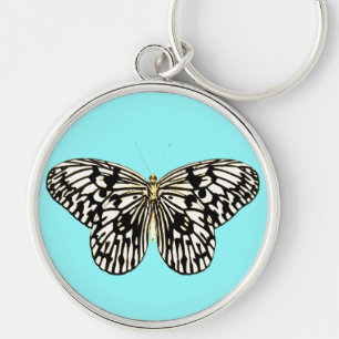 Black and white butterfly, turquoise background keychain
