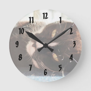 black and white cat face animal photo yellow eyes round clock