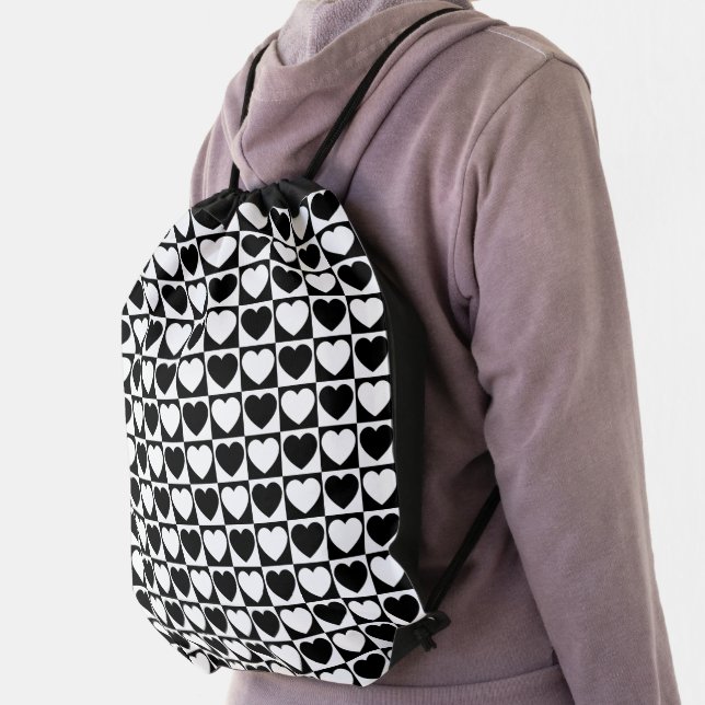 Black and White Checkerboard Heart Pattern Drawstring Bag (Insitu)