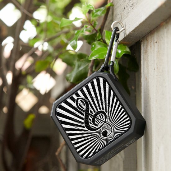 Black and white clef music note on starburst bluetooth speaker
