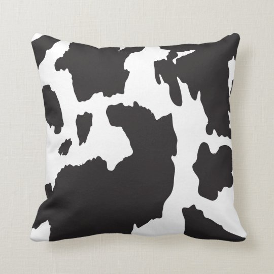 black and white cow print pillows