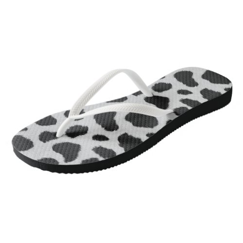 Black and white cow spots pattern fur texture flip flops