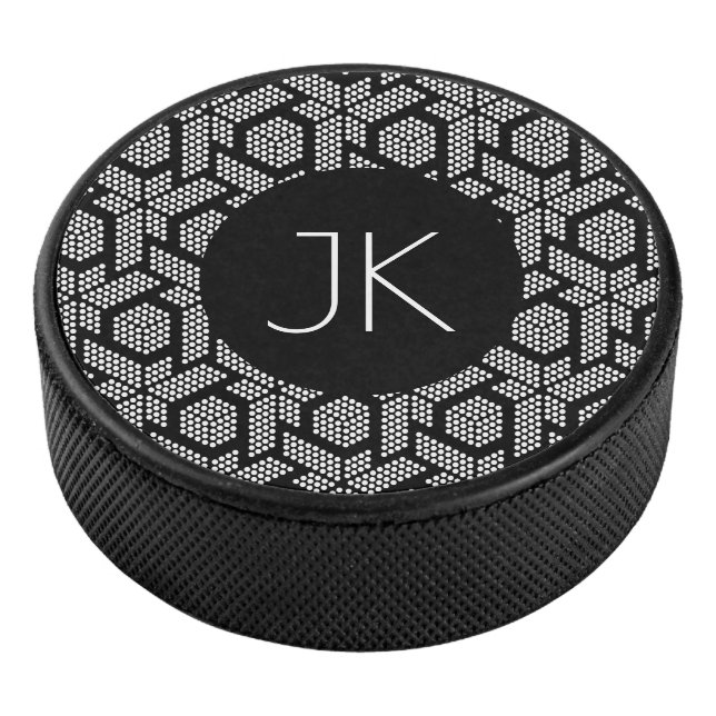 Black and white dotted geometric shapes pattern hockey puck (3/4)
