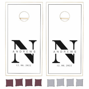 Black and white Farmhouse Family Monogram Name Cor Cornhole Set