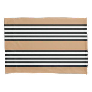 Black and white five stripe pattern with tan pillow case