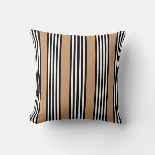 Black and white five stripe pattern with tan throw pillow