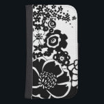 Black and White Floral Garden Graphic Pattern Samsung S4 Wallet Case<br><div class="desc">A graphic pattern that showcases a black and white floral garden scene,  created by Chariklia Zarris. Even with only two colors the painting is almost overwhelming in its beauty. Give yourself the gift of an exquisite floral display by purchasing this print today!</div>
