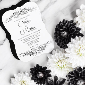 Black And White Flourish Elegance Wedding Invitation by SocialiteDesigns at Zazzle