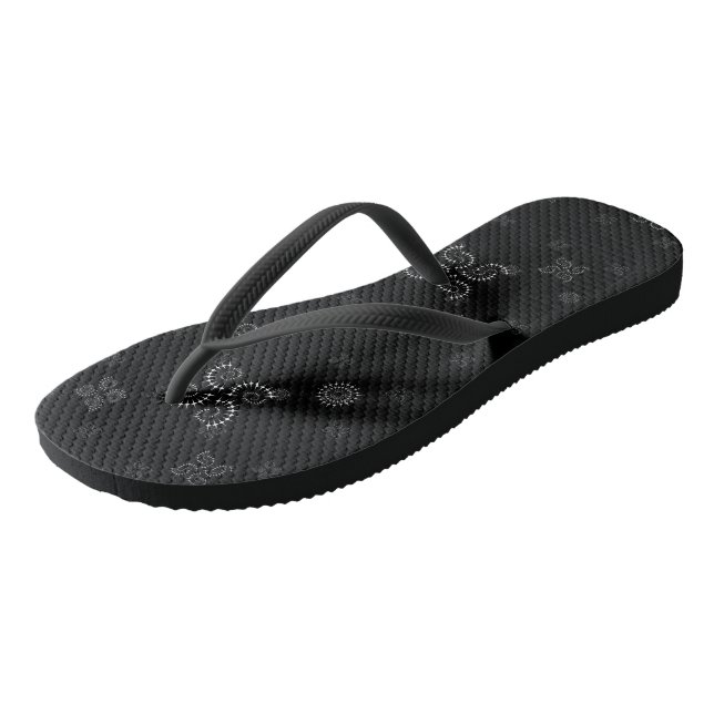 Black and white geometric flip flops (Angled)