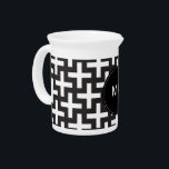 Black and White Geometric Pitcher<br><div class="desc">Black and White- always in style- Shown here  in a Stylish and trendy modern cross pattern. Shown here in Black and White for that totally Chic look</div>