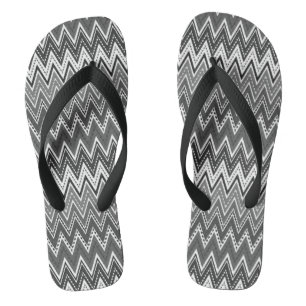 Black and white geometric zigzag pattern flip flops