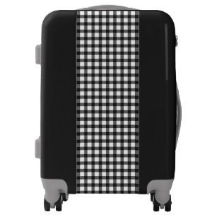 white and black luggage