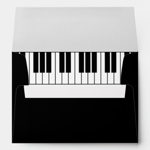Black and white grand piano keys lined envelopes