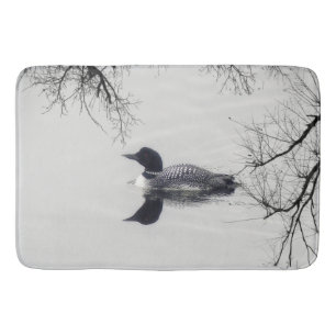 Black and white loon on a lake Bathroom mat