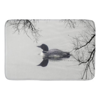 Black and white loon on a lake Bathroom mat
