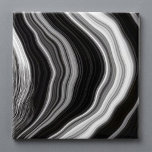 Black and white marble agate effect tile<br><div class="desc">This modern tile features a sophisticated blend of black,  white,  and grey in a striking agate inspired marble effect. With abstract,  flowing lines,  it brings elegant stone texture and a monochrome palette to any space. Perfect for luxury bathrooms or contemporary interiors seeking a touch of stylish artistry.</div>