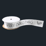 Black and White Merry Christmas Gift Ribbon<br><div class="desc">This black and white Merry Christmas ribbon with holly is the perfect compliment to your other items in the "A Chalkboard Christmas' collection of monochrome, chalkboard-like décor. Check out the other items in the range! Remember, you can put this design on any item – mugs, aprons, cushions etc, if you...</div>