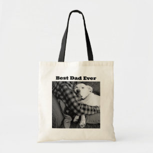 Black and White Photo of Dog Snuggling with Dad Tote Bag