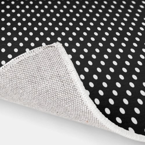 Black and white polka dot rug for living room area