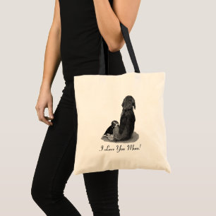black and white puppy beagle cuddling mom dog tote bag