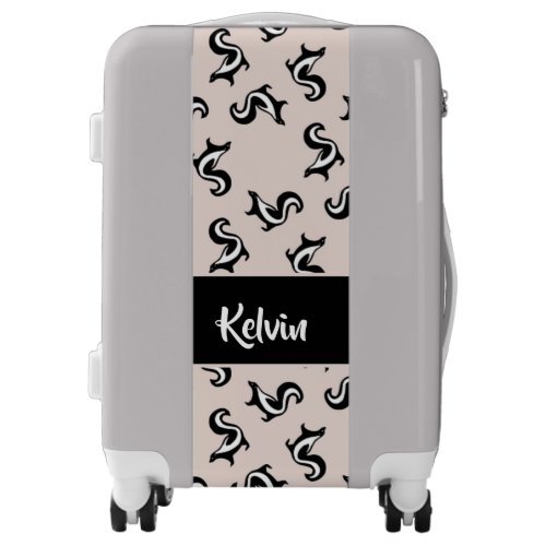Black and white skunks on rose pink luggage