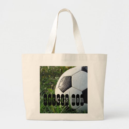 Black and White Soccer Ball in Green Grass Large Tote Bag