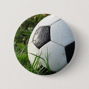 Black and White Soccer Ball in Green Grass Pinback Button