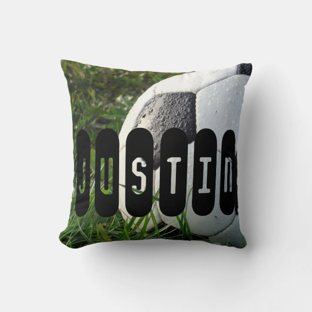 Black and White Soccer Ball in Green Grass Throw Pillow (Front)