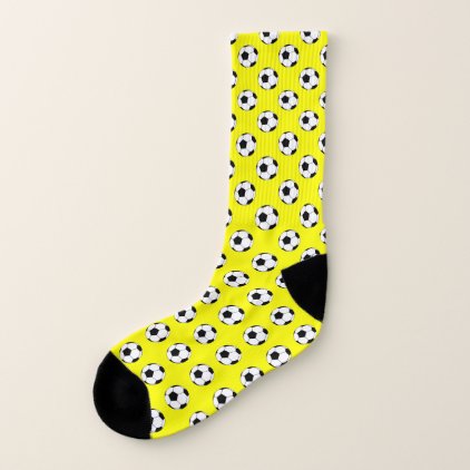 Black and White Soccer Balls on Yellow Socks