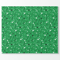 black and white stars on green wrapping paper