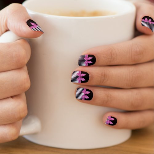 Black and white stripes with a pretty hot pink bow minx nail art